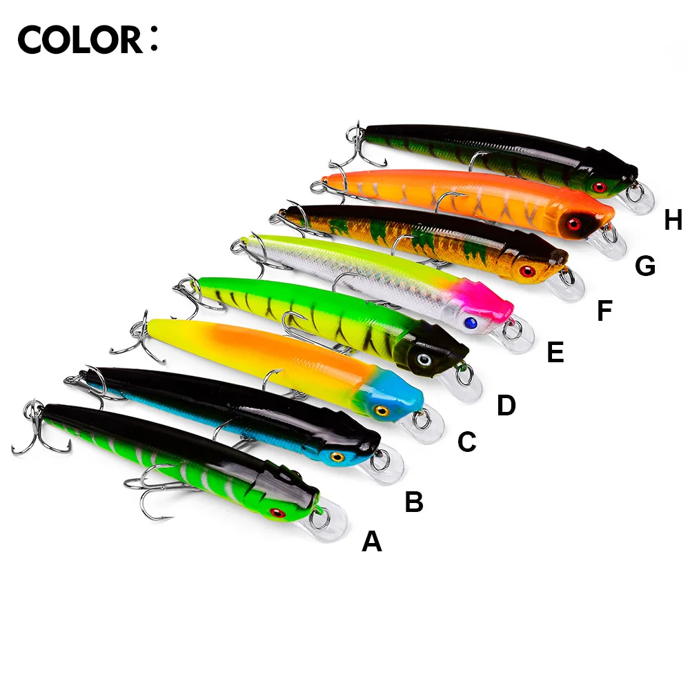 Floating minnow lure shown in water tank demonstrating buoyancy