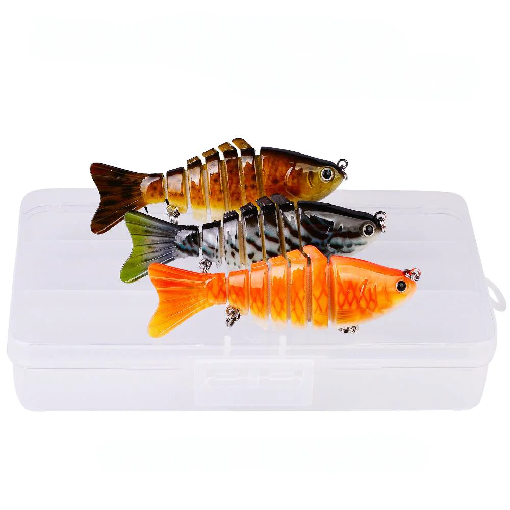 Three-piece fishing lure set in plastic storage case with black-orange designs
