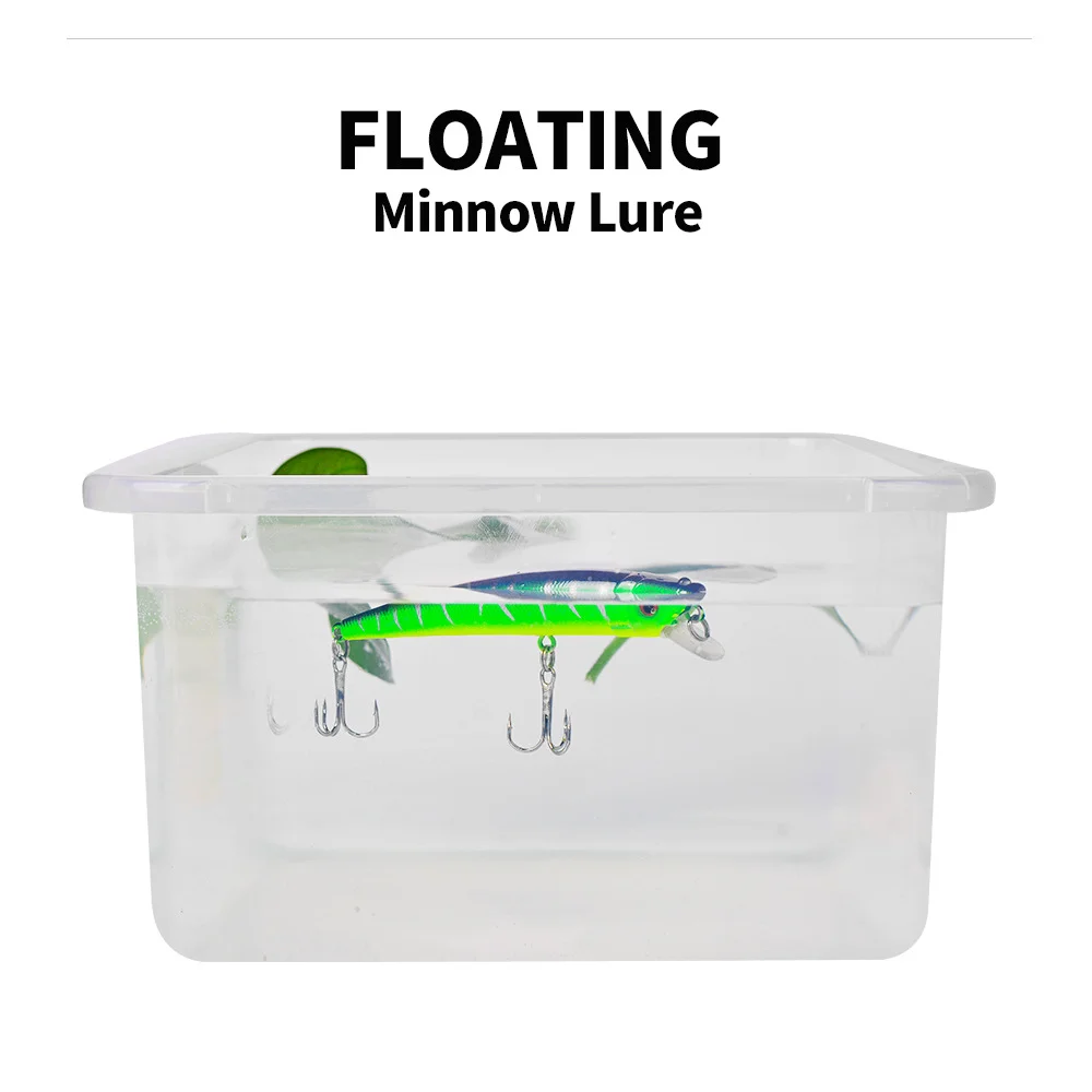 Floating minnow lure shown in water tank demonstrating buoyancy