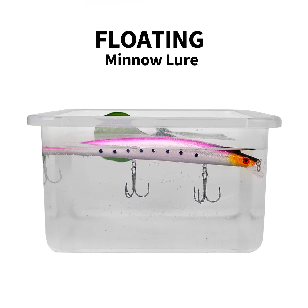 Floating lure test in water container showing buoyancy effect