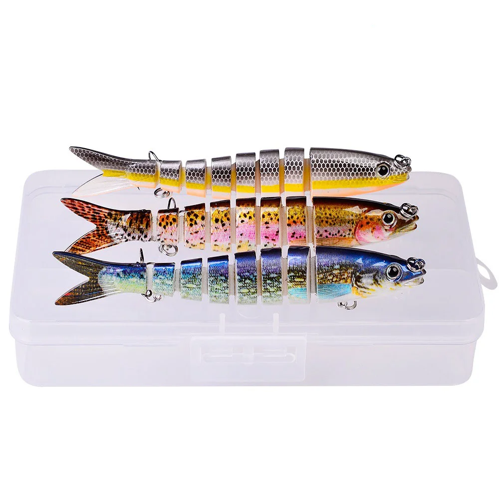 Three lures in a clear plastic case with bright designs