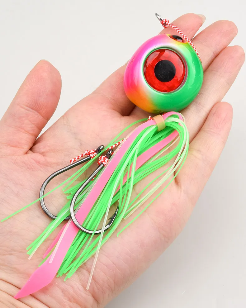 Close-up of 3D fish eye simulation with orange lure body
